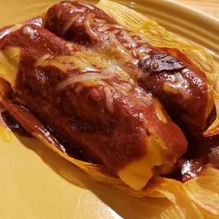 Tamales with chili enchilada sauce