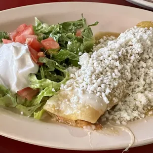 Chicken enchilada with green salsa