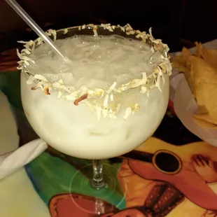a margarita with a straw in it
