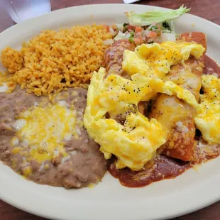 El Mexicana breakfast. Two eggs, tamale and enchilada with beans and rice