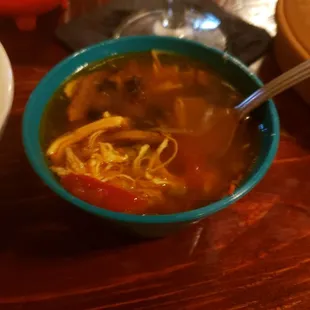 Small bowl of chicken tortilla soup that is served with the Pollo Del Mar.