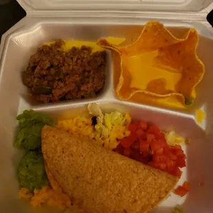 The beef taco and creamy cheese puff you receive with the La Tapatia meal!