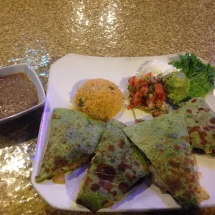 Shredded Chicken Quesadillas on Spinach Tortilla.