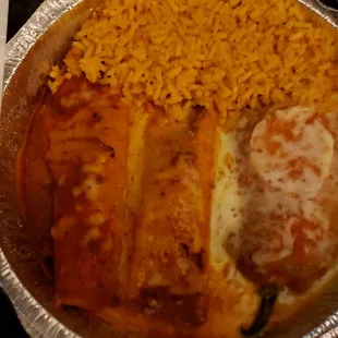 La Tapatia!(1 poblano pepper topped with chili gravy and cheese, two beef enchiladas &amp; a side of rice with a taco and cheese puff in a box.)