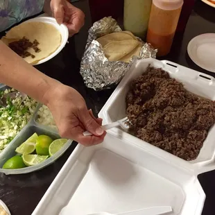 Barbacoa with tortillas and the toppings!