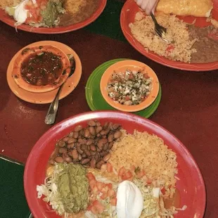 plates of mexican food on a table