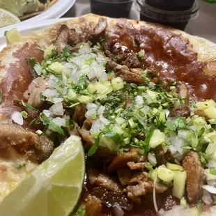 Gringa (Flour tortilla, queso, al pastor, cilantro, onion, pineapple)