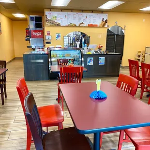 a table and chairs in a restaurant