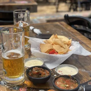 Chips, salsa, queso, Stella beer