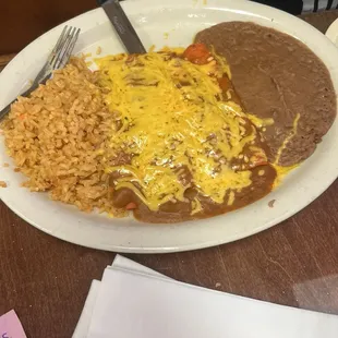 The enchiladas for my son. I won't lie I'm bias to the traditional Mexican enchiladas, but my sons swear they were good.