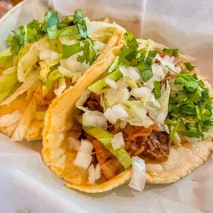Chicken and carnitas tacos