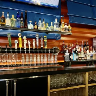 a bar with a variety of liquors