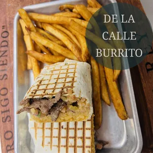 De la calle burrito /10 inch tortilla flour stuffed with rice,beans,cilantro, cebolla and choice of meat