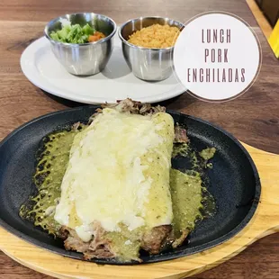 Two pork enchiladas topped with
Salsa verde &amp; your choice of two sides