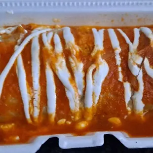 Super Carne Asada burrito, wet style. Regular (no sauce) is excellent, too!