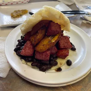Arepa with sausage, plantain and black bean