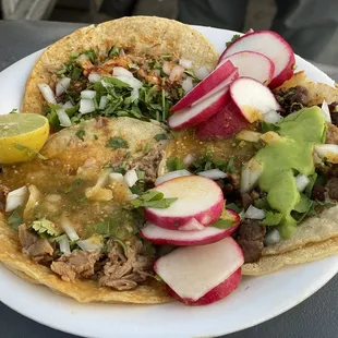 1 Asada, 2 Birria tacos. Keep in mind, it's the large tortilla.
