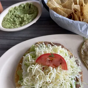 Veggie tostada, guac &amp; chips