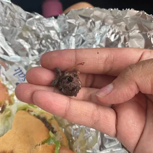 This is how the cabeza meat looked like. All rolled up in balls like it has been sitting on the heat for too long. Crusty and burnt.