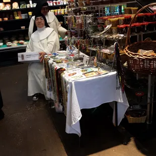And I can get a rosary for Maria when I get mangoes and coconut water.
