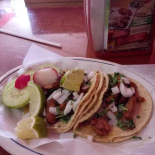 three tacos on a plate