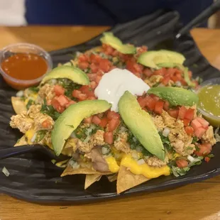The super nachos were delicious, and the presentation was beautiful. Really recommend them but not really for sharing.