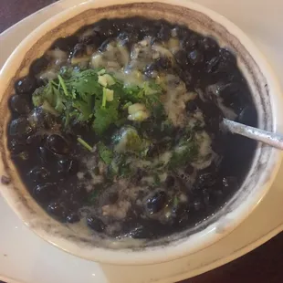 a bowl of black bean soup