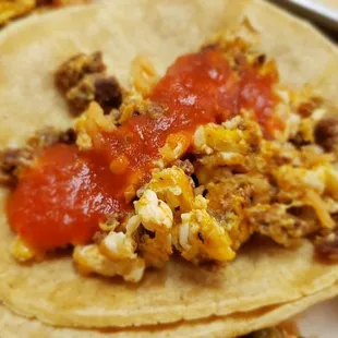 a breakfast taco on a plate