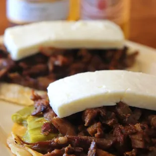 a close up of a taco sandwich