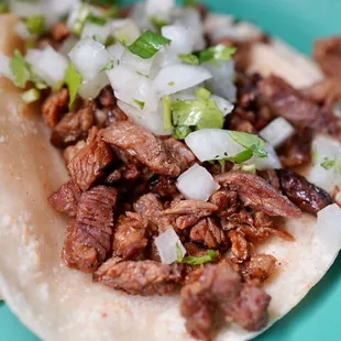 a closeup of a taco on a plate