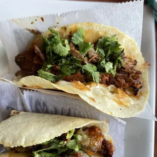 Birria taco and Al pastor taco