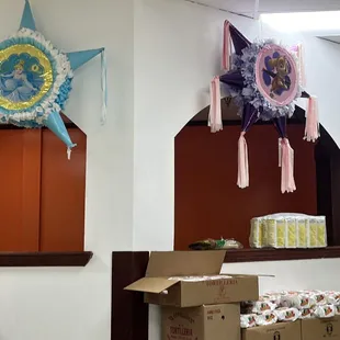 a room with boxes and decorations