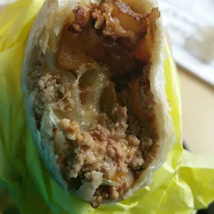 Yummy Colorado burrito is hot, filling and HUGE! COME HUNGRY Bacon, potato, beef, cheese.. it's packed with goodness
