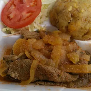 Mofongo with steak and onions