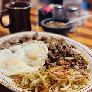 Picadillo withOver easy eggs