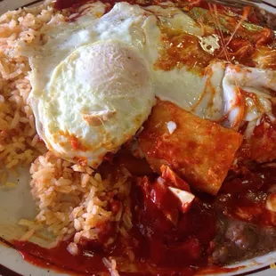 Enchilada with eggs on top. Delish