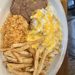 Small chicken fried steak with cheese and gravy.