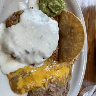 Chicken fried steak combo with taco &amp; enchilada.