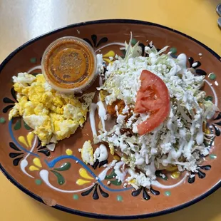 Sope con chorizo y papas with a scrambled egg.