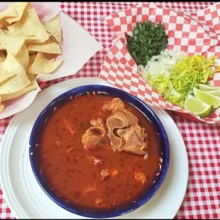 a plate of tortilla and a bowl of tortilla