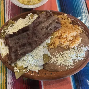 Green chilaquiles with a side of cesina