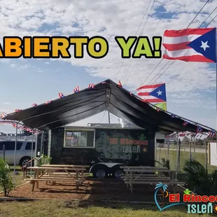 a trailer with a flag on it