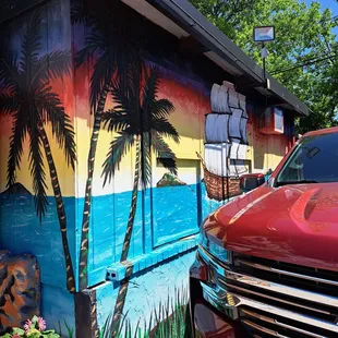 a truck parked in front of a house