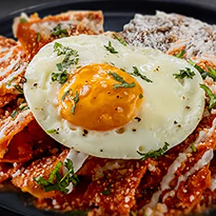 Now serving Chilaquiles Rojos y Verdes