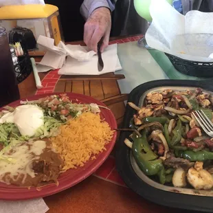 Steak chicken shrimp fahitas,new on menu think its a grande shimechonga and pops had a lime magerita