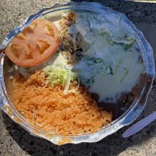 Mexico Special.  Delicious shredded chicken filled burritos with cheese sauce and sour cream. Highly recommend!