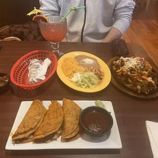 Birria tacos and Hawaiian Fajita.