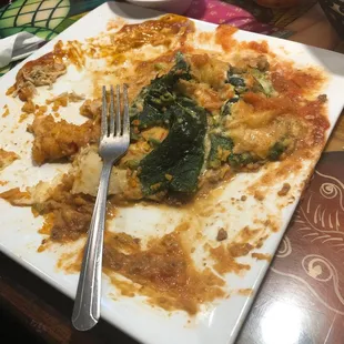 a half eaten plate of food