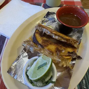 Birria tacos are delicious.