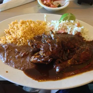 Chicken Mole done right. Rick bayles has nothing on this woman's cooking.